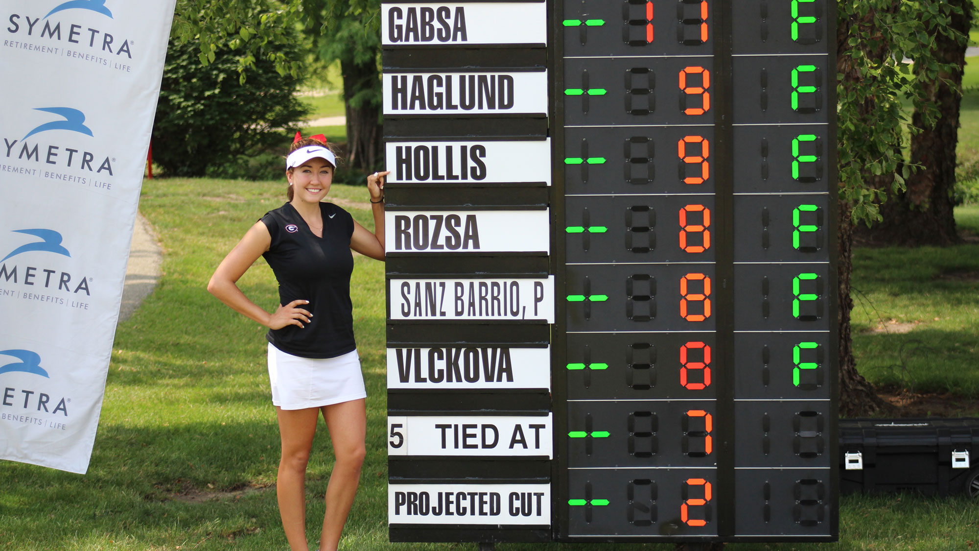 Jillian Hollis Next to the Scoreboard at the Forsyth Classic 
