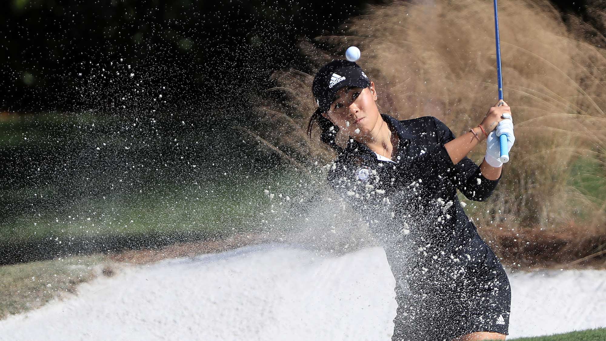Danielle Kang plays her shot out of the bunker on the sixth hole during the second round of the CME Group Tour Championship at Tiburon Golf Club