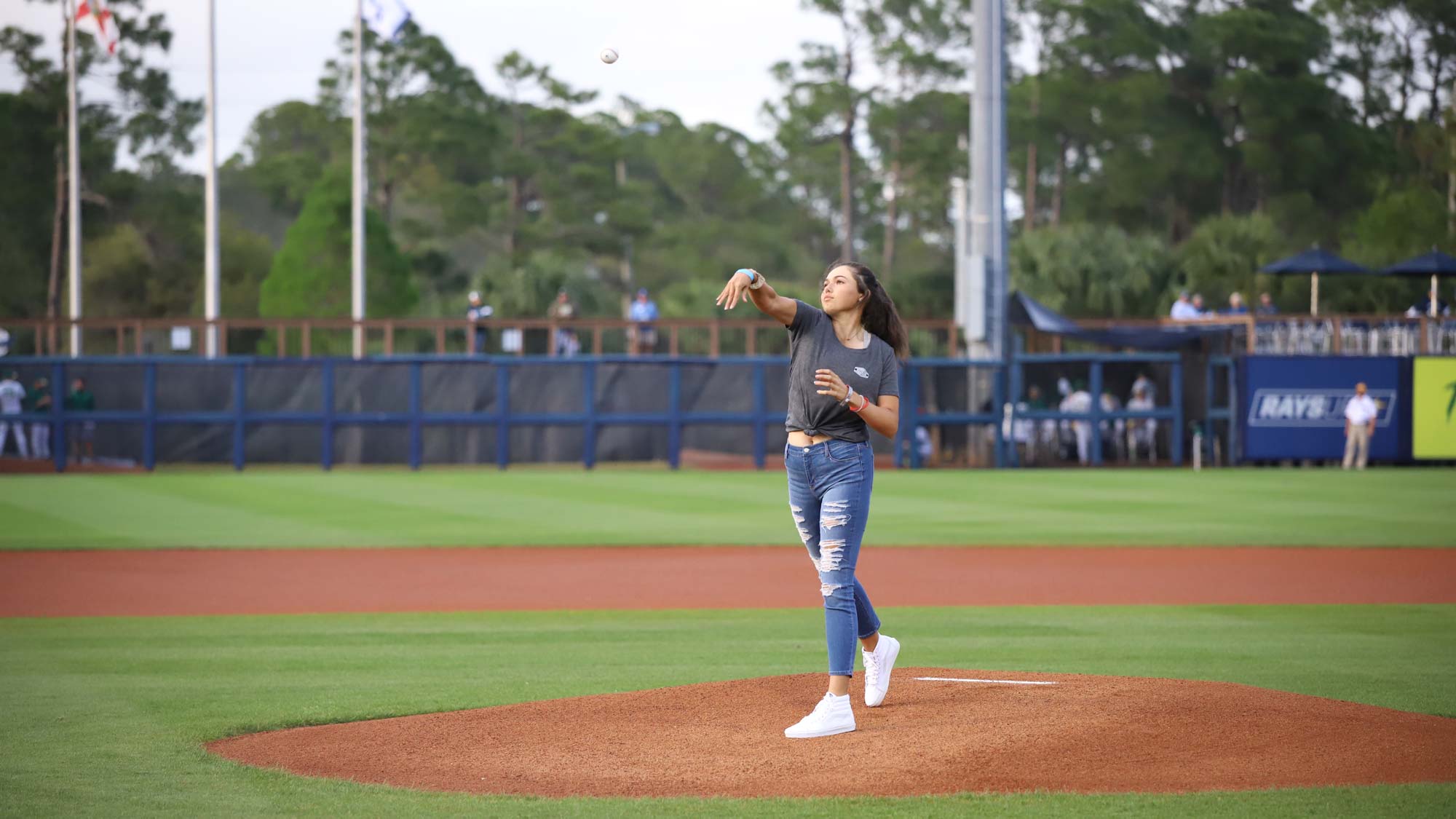 Alexa Pano throws first pitch