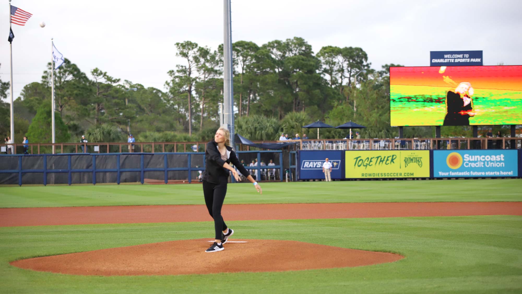 Greta Voelker throws first pitch