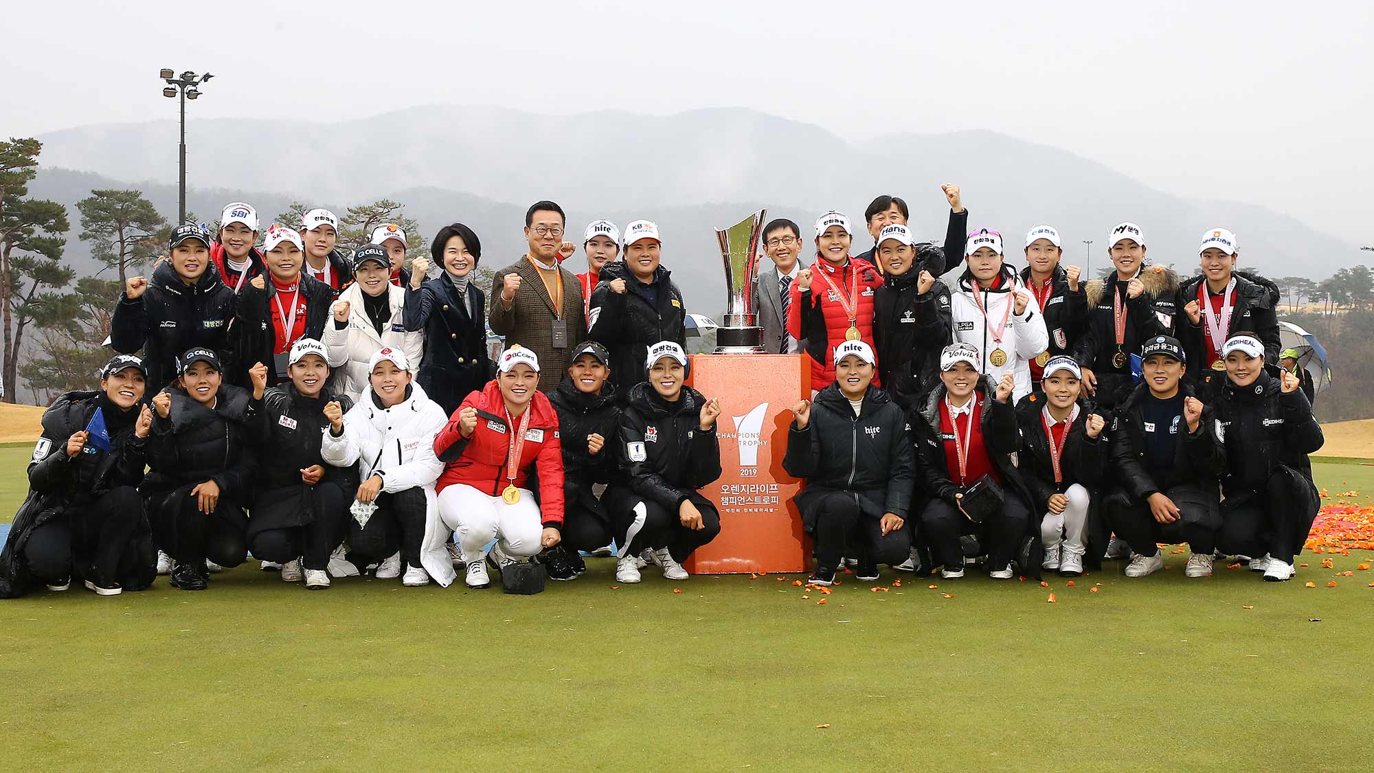 Teams from the LPGA and KLPGA pose after the KLPGA won the 2019 Orange Life Champions Trophy Inbee Park Invitational at Blue One The Honors Country Club in Gyeongju, Republic of Korea
