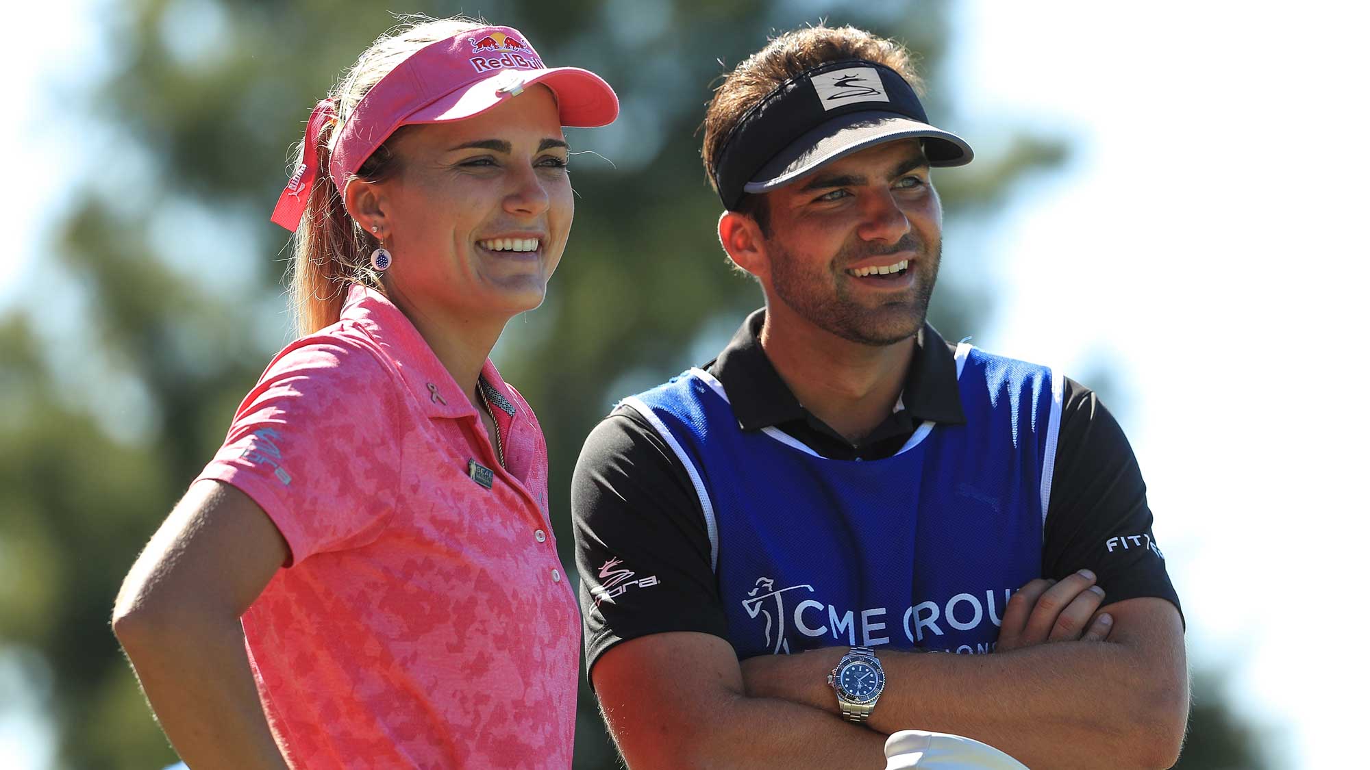 Lexi Thompson talks with her brother and caddie, Curtis, on the fourth tee during the third round of the LPGA CME Group Tour Championship