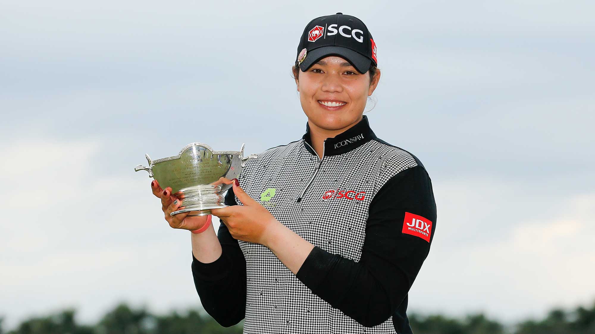 Ariya Jutanugarn of Thailand poses for a photo with the Vare Trophy after the final round of the LPGA CME Group Tour Championship