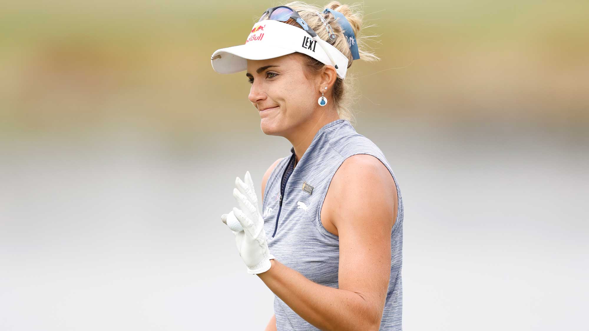 Lexi Thompson of the United States reacts after making a birdie putt on the 18th green during the first round of the CME Group Tour Championship